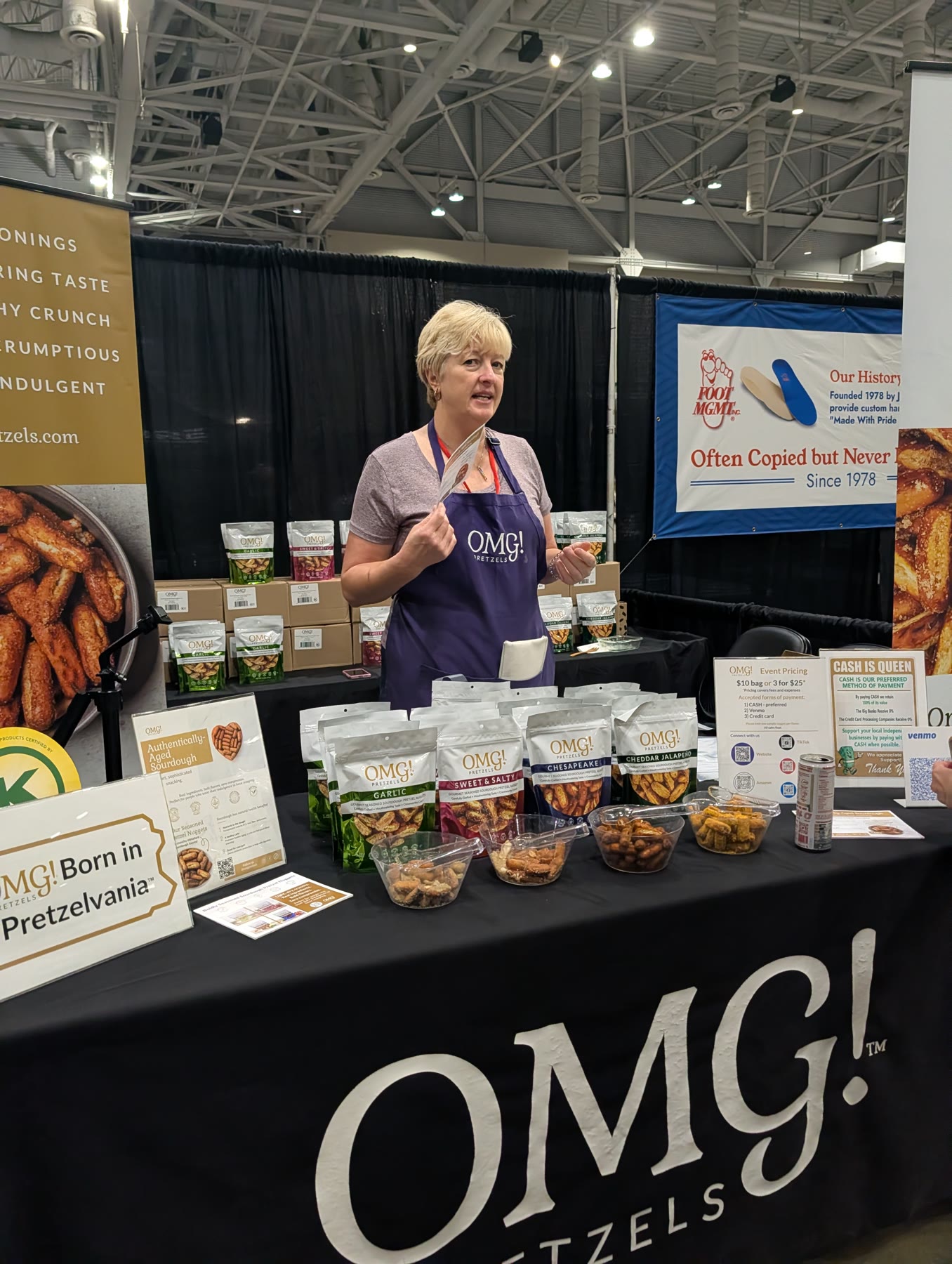 OMG! Pretzels booth with bags of pretzels