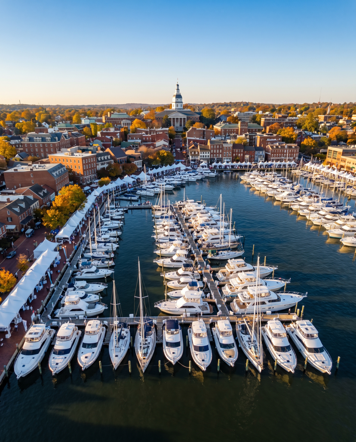 Aerial view of Annapolis City Dock packed with boats during the Annapolis Boat Shows, State House dome behind
