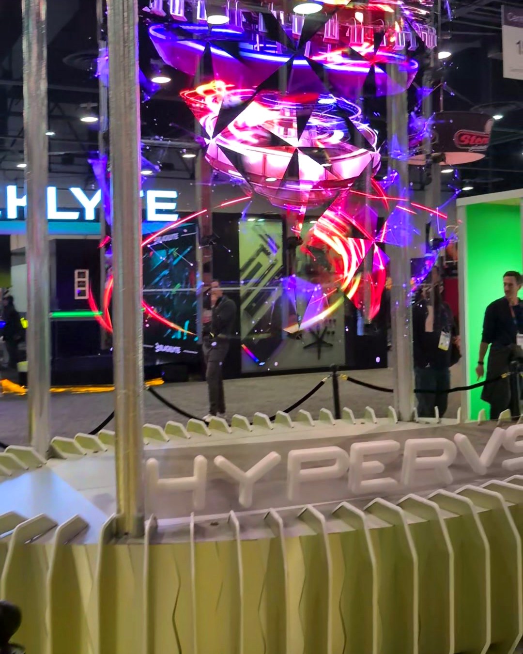 Close view of the HYPERVSN SmartV Wall base and spinning 3D visuals at CES 2025